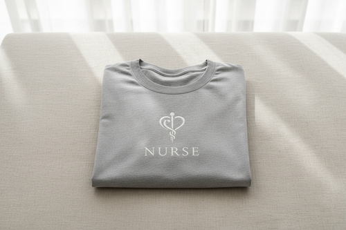 Shift Ready premium nurse t-shirt flat lay on neutral background